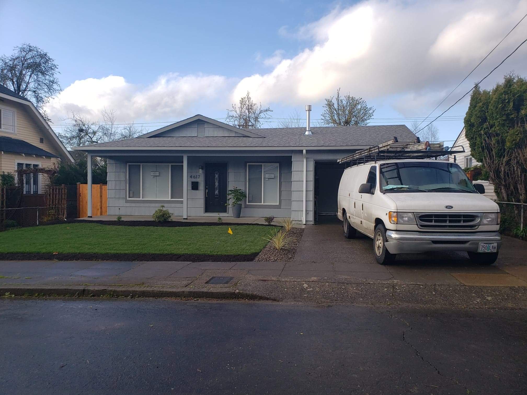 complete renovated home, new grass front yard, and gravel.